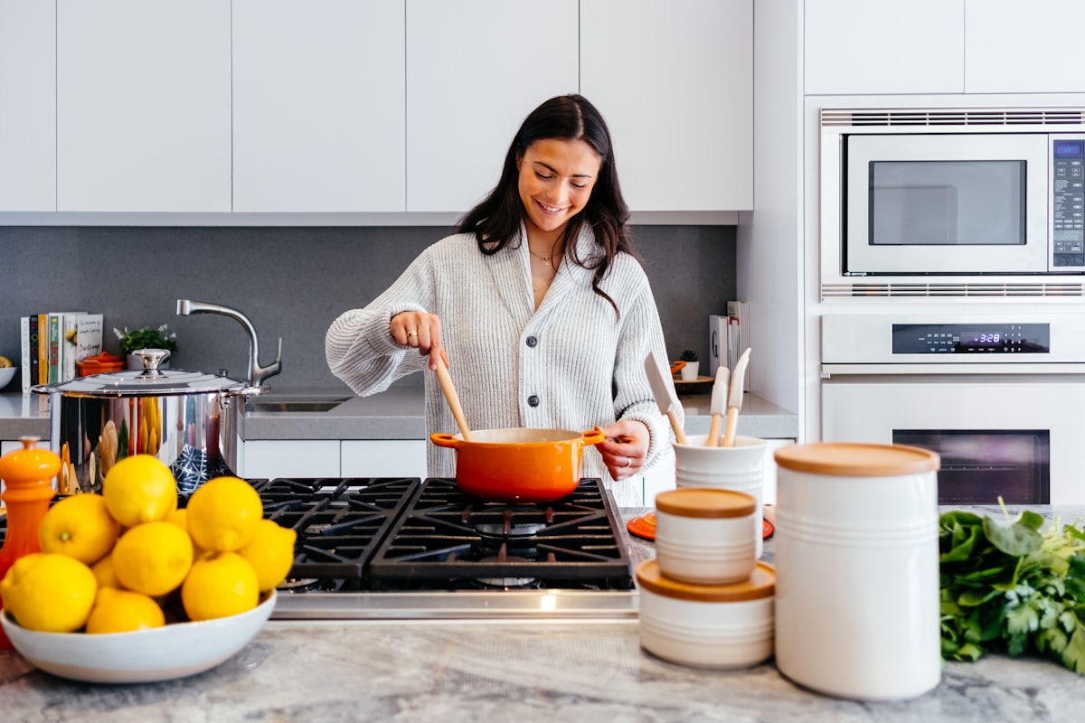 Hands preparing nutritious food in kitchen